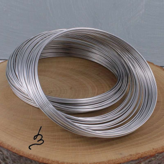 Paměťový drát nerez 304  pr. 6 cm - 100 ot.